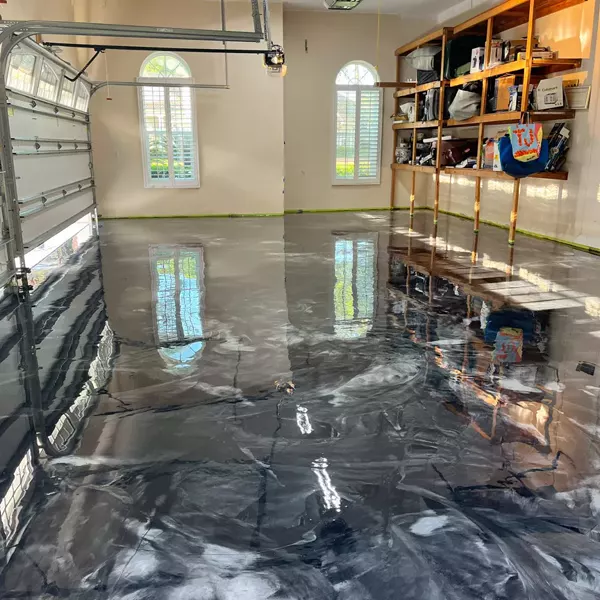 A recent metallic floor for a 3 car garage