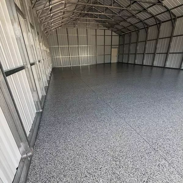 Upgrade your warehouse with epoxy flake floors! 💪✨