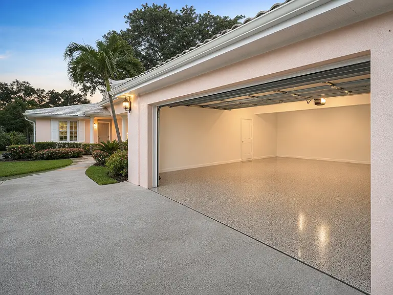 Decorative flake garage floor shown on the Bay Pines service page.