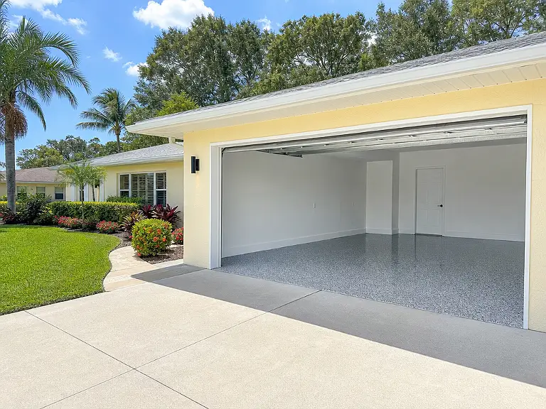 Decorative flake garage floor shown on the Beacon Square service page.