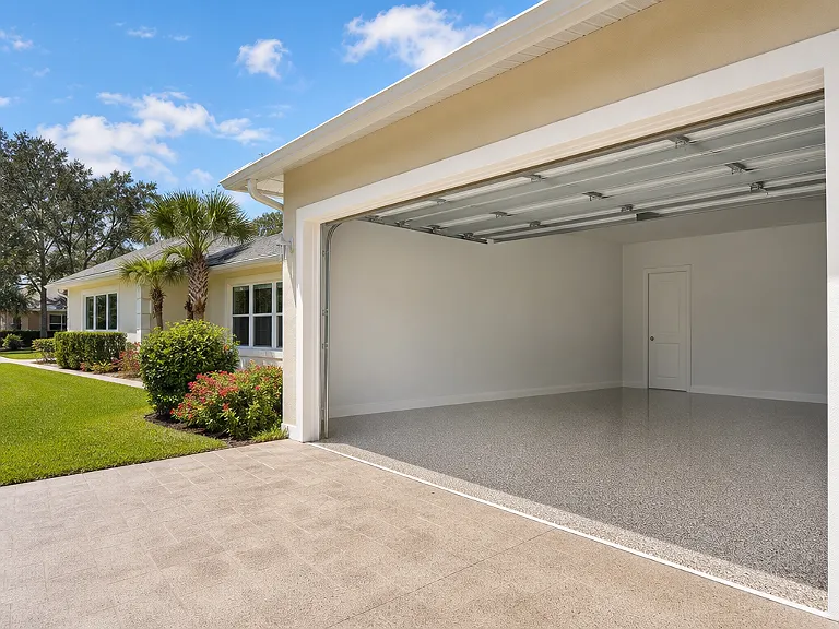 Decorative flake garage floor shown on the Bradenton service page.