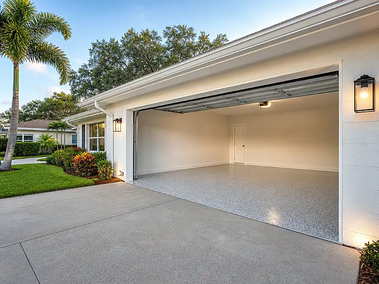 Decorative flake garage floor shown on the Elfers service page.