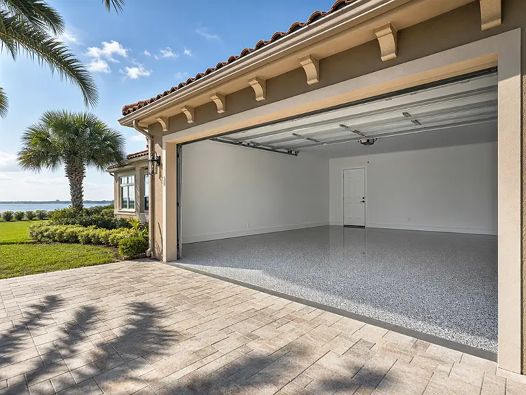 Decorative flake garage floor shown on the Harbor Bluffs service page.