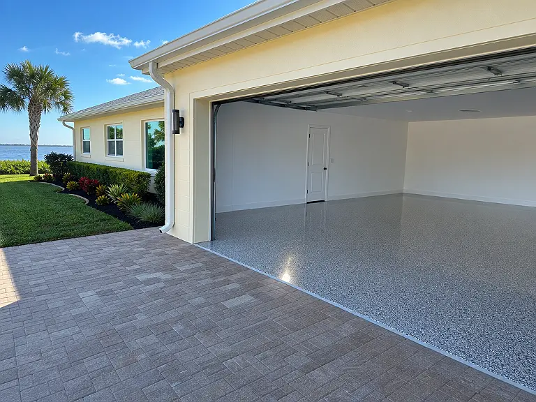 Decorative flake garage floor shown on the North Redington Beach service page.