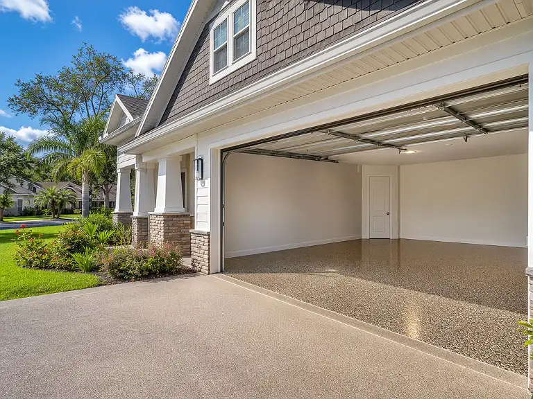 Decorative flake garage floor shown on the Oldsmar service page.