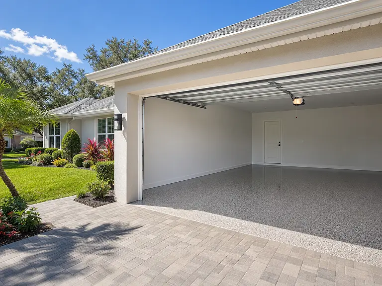 Decorative flake garage floor shown on the Palm River-Clair Mel service page.