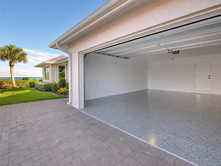 Decorative flake garage floor shown on the Redington Shores service page.