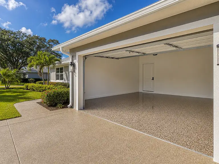 Decorative flake garage floor shown on the Seminole service page.