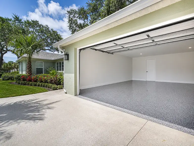 Decorative flake garage floor shown on the South Highpoint service page.