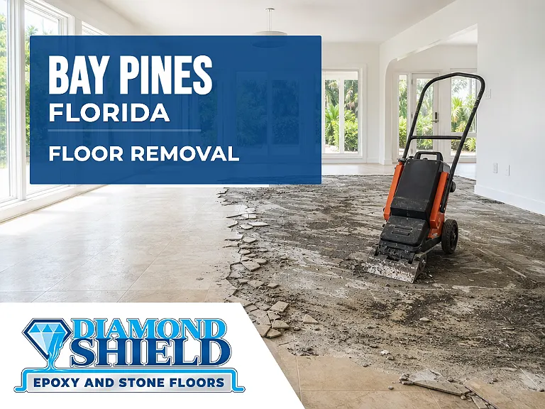 Floor removal company machine lifting tile from a slab in Bay Pines, FL