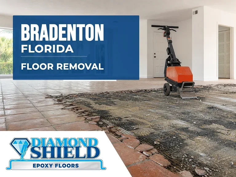Floor removal company machine lifting tile from a slab in Bradenton, FL