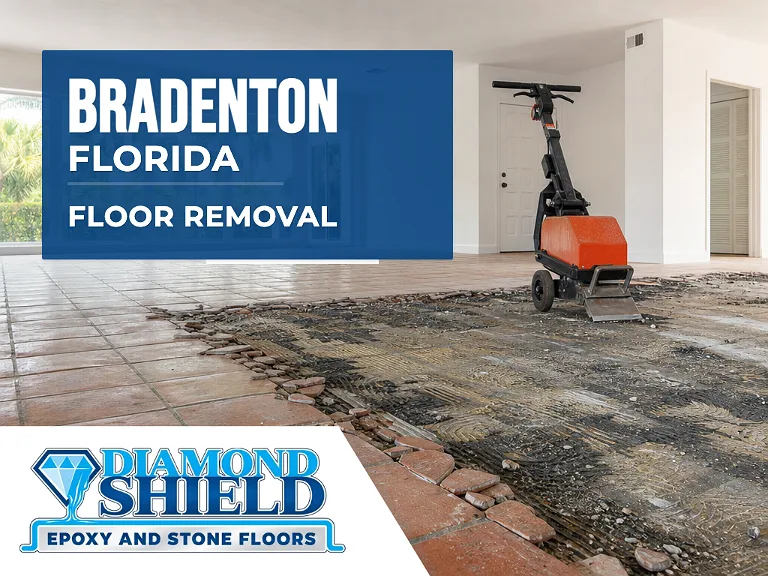 Floor removal company machine lifting tile from a slab in Bradenton, FL