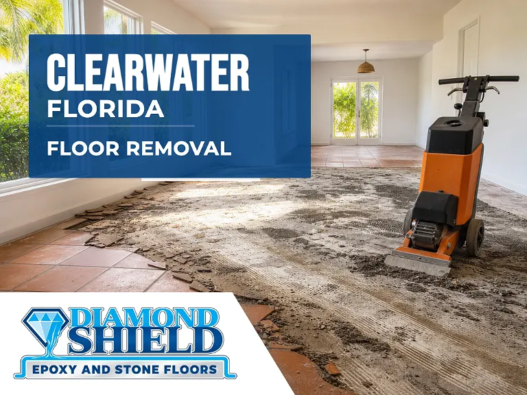 Floor removal company machine lifting tile from a slab in Clearwater, FL