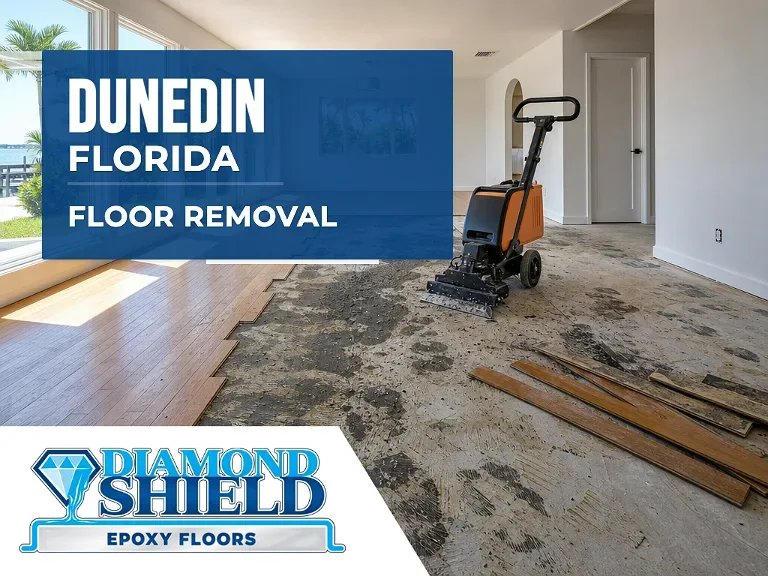 Floor removal company machine lifting tile from a slab in Dunedin, FL