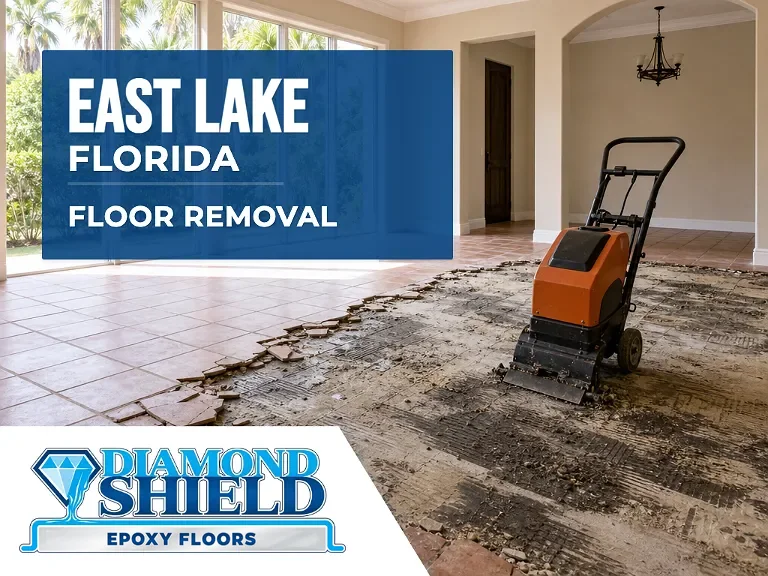 Floor removal company machine lifting tile from a slab in East Lake, FL