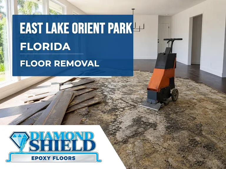 Floor removal company machine lifting tile from a slab in East Lake-Orient Park, FL