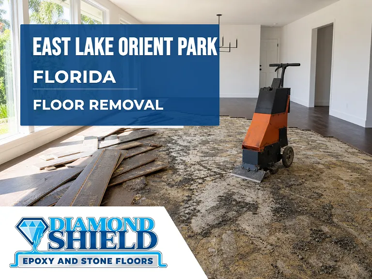 Floor removal company machine lifting tile from a slab in East Lake-Orient Park, FL