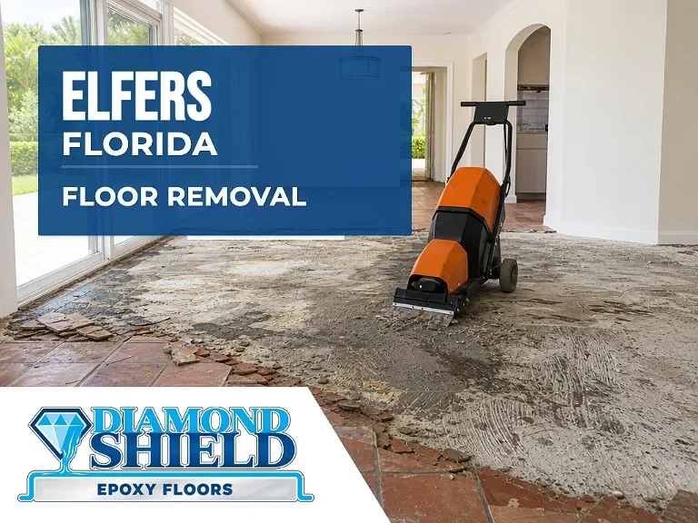 Floor removal company machine lifting tile from a slab in Elfers, FL