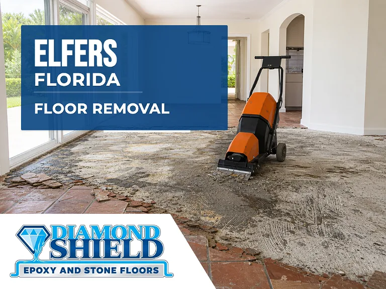 Floor removal company machine lifting tile from a slab in Elfers, FL