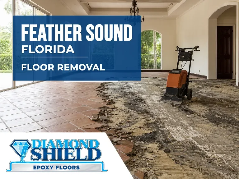 Floor removal company machine lifting tile from a slab in Feather Sound, FL