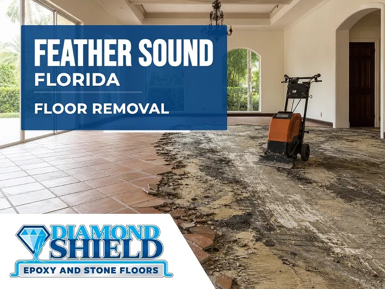 Floor removal company machine lifting tile from a slab in Feather Sound, FL