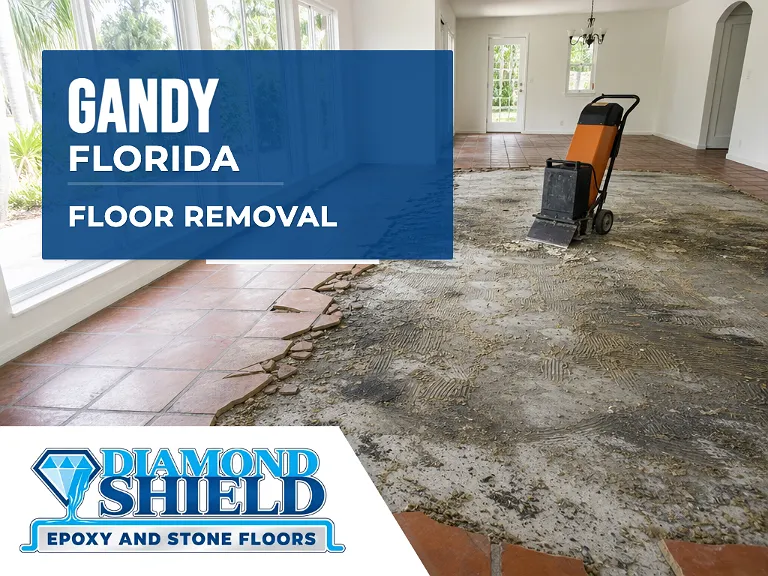 Floor removal company machine lifting tile from a slab in Gandy, FL