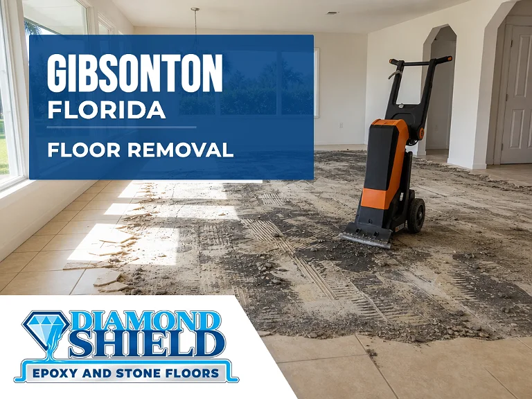 Floor removal company machine lifting tile from a slab in Gibsonton, FL