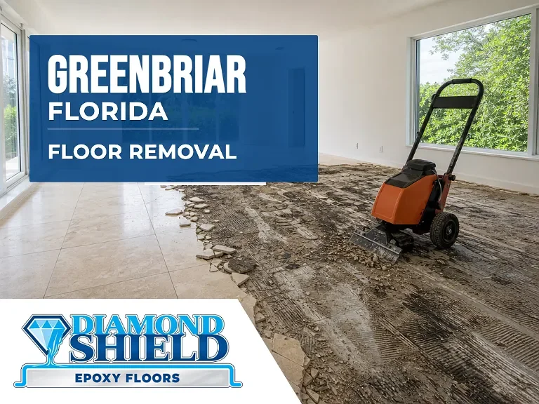 Floor removal company machine lifting tile from a slab in Greenbriar, FL