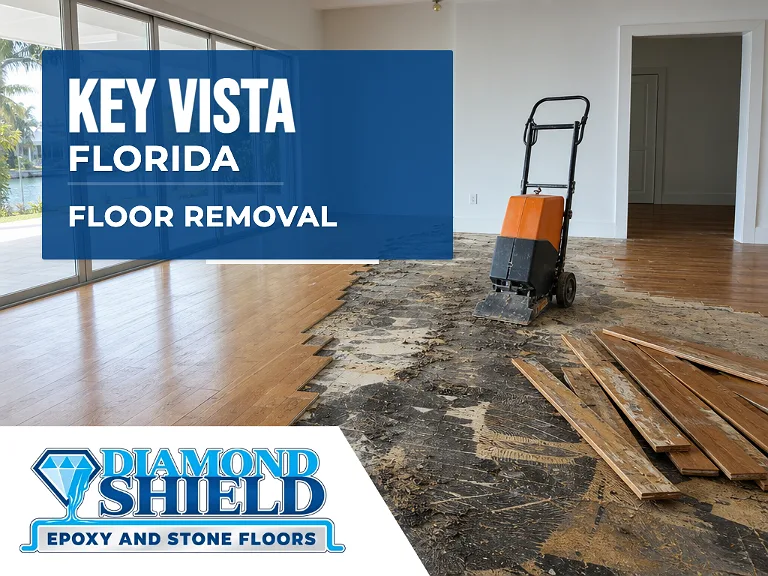 Floor removal company machine lifting tile from a slab in Key Vista, FL