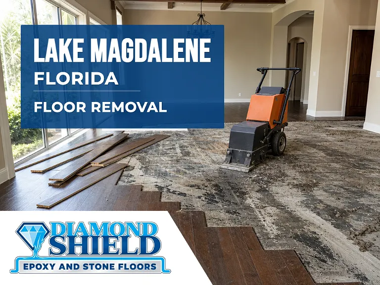 Floor removal company machine lifting tile from a slab in Lake Magdalene, FL
