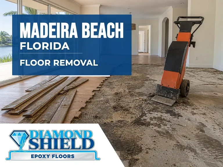 Floor removal company machine lifting tile from a slab in Madeira Beach, FL