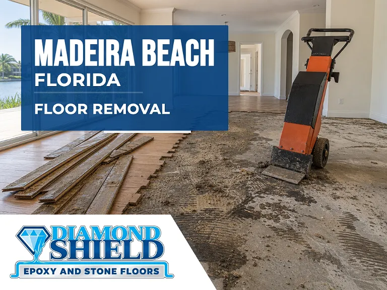 Floor removal company machine lifting tile from a slab in Madeira Beach, FL