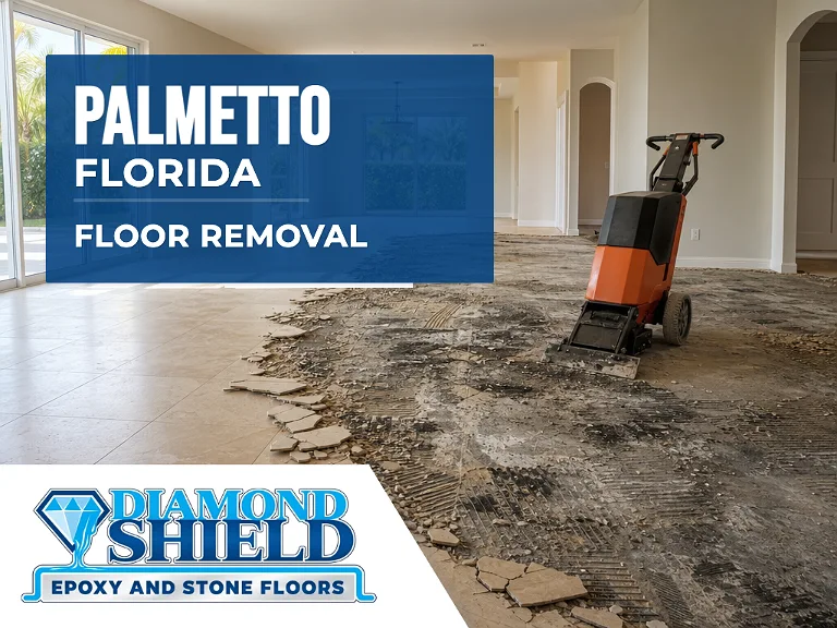 Floor removal company machine lifting tile from a slab in Palmetto, FL