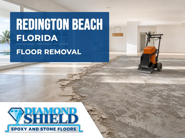 Floor removal company machine lifting tile from a slab in Redington Beach, FL