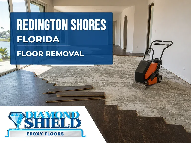 Floor removal company machine lifting tile from a slab in Redington Shores, FL