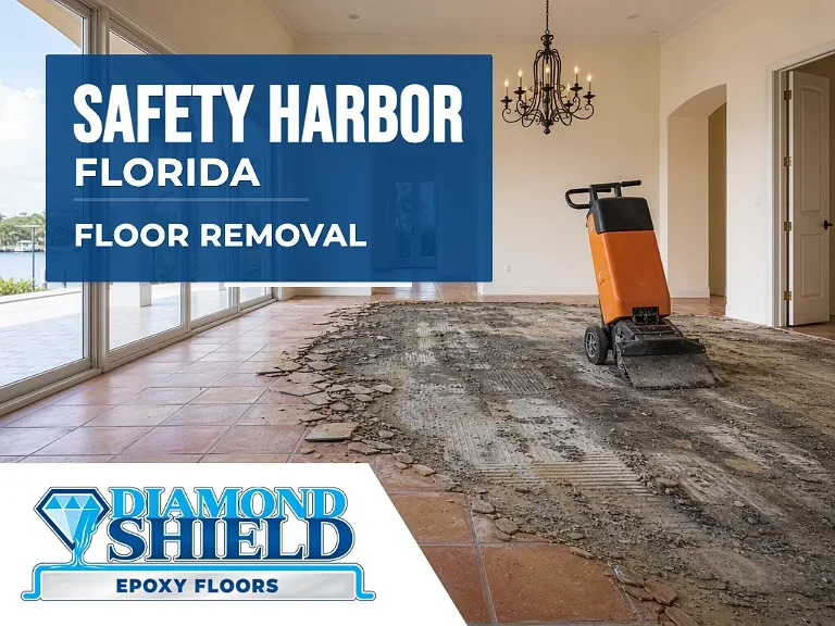 Floor removal company machine lifting tile from a slab in Safety Harbor, FL