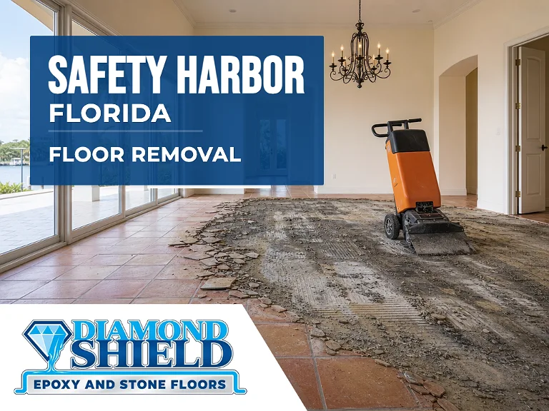 Floor removal company machine lifting tile from a slab in Safety Harbor, FL