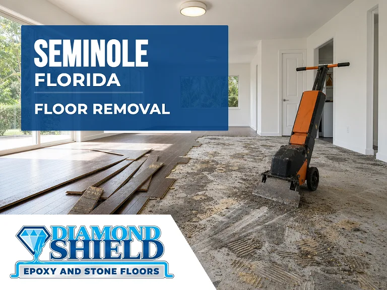 Floor removal company machine lifting tile from a slab in Seminole, FL