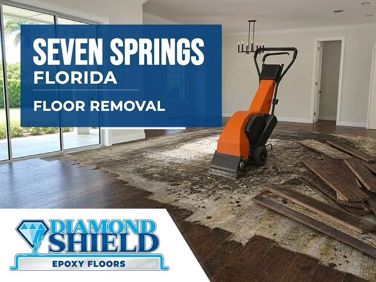 Floor removal company machine lifting tile from a slab in Seven Springs, FL