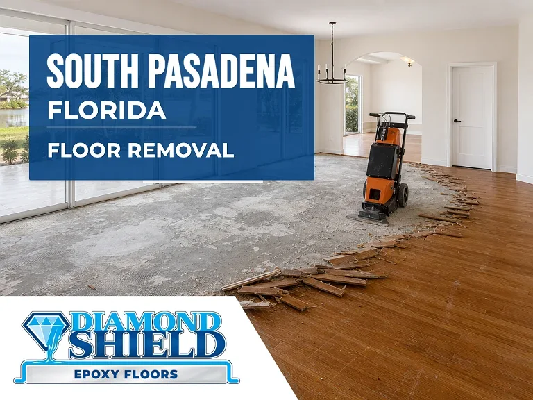 Floor removal company machine lifting tile from a slab in South Pasadena, FL