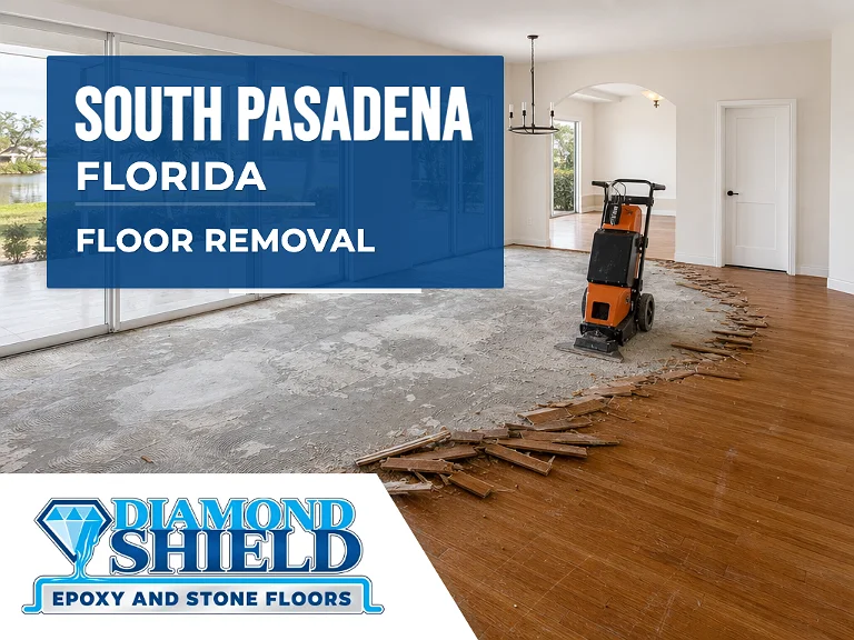Floor removal company machine lifting tile from a slab in South Pasadena, FL