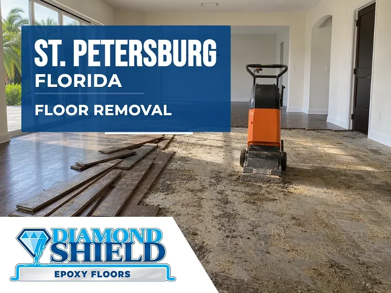 Floor removal company machine lifting tile from a slab in St. Petersburg, FL
