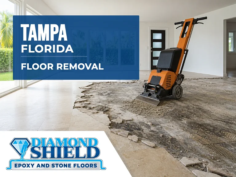 Floor removal company machine lifting tile from a slab in Tampa, FL