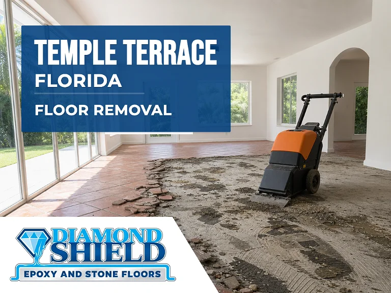 Floor removal company machine lifting tile from a slab in Temple Terrace, FL