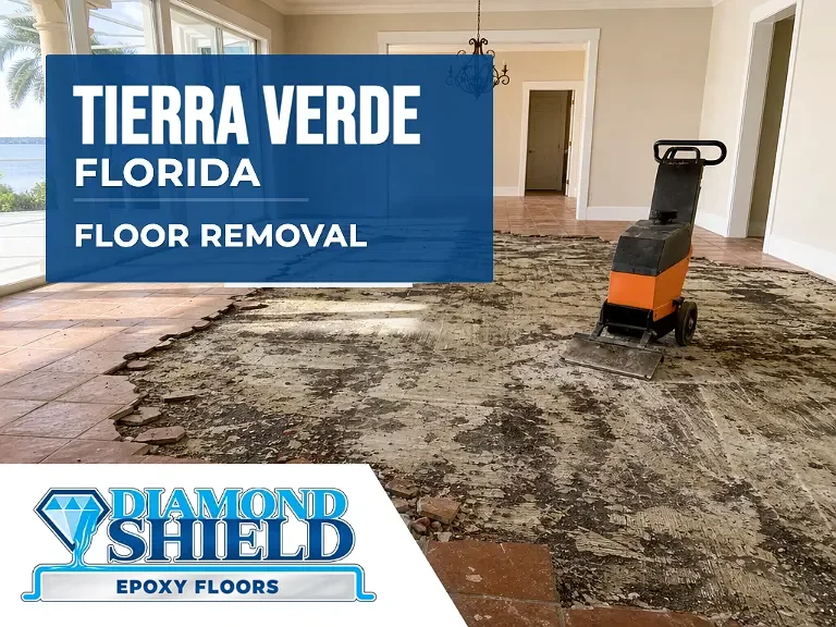Floor removal company machine lifting tile from a slab in Tierra Verde, FL
