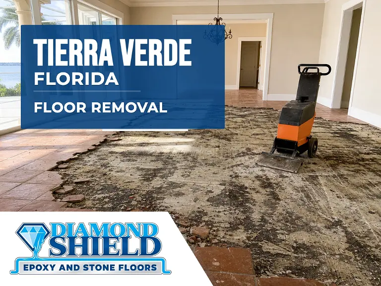 Floor removal company machine lifting tile from a slab in Tierra Verde, FL