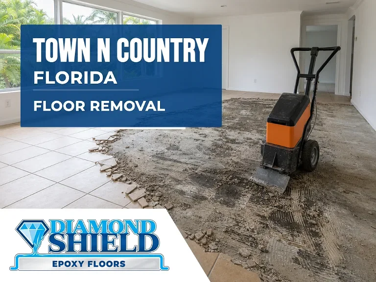 Floor removal company machine lifting tile from a slab in Town 'n' Country, FL