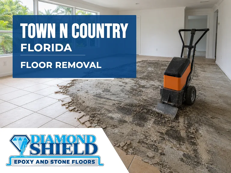 Floor removal company machine lifting tile from a slab in Town 'n' Country, FL