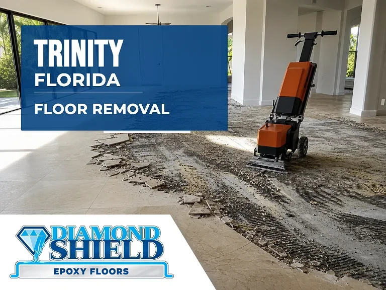 Floor removal company machine lifting tile from a slab in Trinity, FL