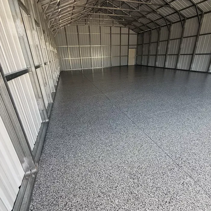 Commercial flake epoxy flooring in a Tampa, FL steel warehouse